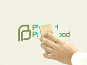 Editorial illustration of a hand holding a sanding block erasing the Planned Parenthood logo and text.