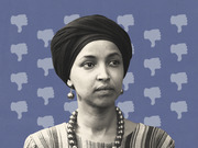 Black and white photo of a woman wearing a head wrap and bead necklace, set against a blue background covered with thumbs-down icons.