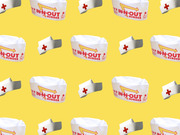 Repeating pattern of In-N-Out Burger paper hats and nurse caps on a yellow background, used as decorative editorial art.