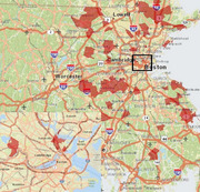 Map of the greater Boston and Worcester, Massachusetts area showing red shaded regions, likely indicating data density or incident locations, with a zoomed inset of central Boston.
