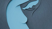 Paper-cut style editorial illustration of a nude female figure in profile, rendered in layered blue and gray tones with head bowed.