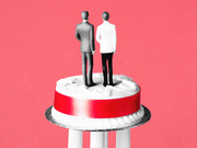 Two male figurines standing on top of a wedding cake against a pink-red background, representing same-sex marriage.