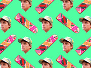 Repeating pattern of Marty McFly's face and Mattel Hoverboard from Back to the Future on a green background.