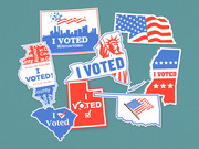 A collection of red, white, and blue I Voted stickers shaped like various US states including New York, Utah, Illinois, and South Carolina.