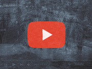 Editorial illustration showing the YouTube play button logo centered on a dark textured background with faint video player UI elements.