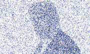 A mosaic or pixel-art style illustration composed of tiny blue squares and fragments forming the silhouette of a human figure against a white background.