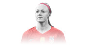 Stylized editorial illustration of a female US soccer player wearing a red Nike USA jersey with FIFA World Cup badge, rendered in partial grayscale.