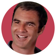 Circular cropped editorial illustration of a smiling man against a red background, styled as a portrait graphic.