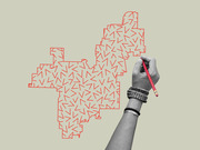 Editorial illustration of a hand holding a pencil drawing a gerrymandered congressional district outline filled with red arrow-like shapes on a beige background.