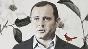 Editorial illustration combining a photographic portrait of a man in a suit with drawn botanical elements including leaves, flowers, and a red cardinal bird.