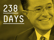 Yellow-tinted editorial graphic showing a smiling man with glasses alongside large text reading 238 Days.