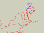 Map of the northeastern United States showing state outlines with red and blue directional arrows overlaid on Maine and surrounding states.