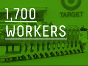 Green-tinted editorial graphic showing large text '1,700 Workers' over a photo of Target shopping carts outside a Target store.