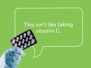 Editorial illustration of a gloved hand holding a blister pack of pills with a speech bubble reading 'This isn't like taking vitamin C.' on a green background.