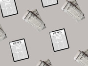 Decorative repeating pattern of tablets displaying news pages and rolled-up business newspapers scattered on a gray background.