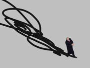 Editorial illustration of a figure in a dark suit casting a shadow shaped like a large signature, suggesting outsized executive power.