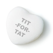 Illustration of a white candy heart stamped with the phrase TIT-FOR-TAT, styled like a Valentine's Day conversation heart.