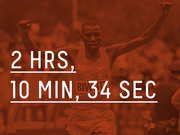 Red-tinted photo of a marathon runner crossing the finish line overlaid with large white text showing a race time of 2 hours, 10 minutes, 34 seconds.