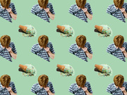 Repeating pattern illustration of a crying boy with a dropped ice cream cone with sprinkles on a green background.