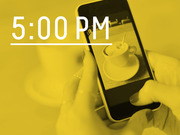 Yellow-tinted editorial graphic showing hands holding a smartphone photographing a coffee cup, with large white text reading 5:00 PM.