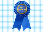A blue ribbon award badge with gold text reading Most Popular, set against a white grid background.