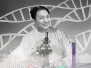 Editorial illustration of a smiling scientist in a lab coat with a microscope and colorful test tubes, set against a grayscale DNA double helix background.