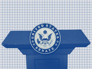 Blue-tinted editorial illustration of a United States Senate podium with the Senate seal, set against a grid-paper background.