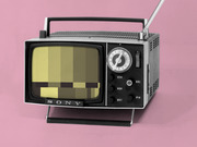 Vintage Sony portable television with a pixelated censored image on screen, set against a pink background.