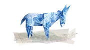 An origami donkey folded from US ten-dollar bills standing on a crumpled map, symbolizing Democratic Party campaign finance.