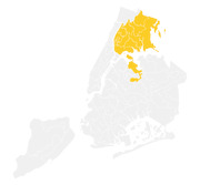 Map of New York City's five boroughs with the Bronx and parts of Queens highlighted in yellow, while other areas remain gray.