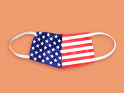 Illustration of a face mask printed with the American flag pattern on an orange background.
