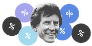 Black and white photo of a smiling man surrounded by colorful circles containing percent signs, used as editorial illustration.