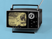 Editorial illustration of a vintage Sony portable TV displaying a Reverend Raphael Warnock U.S. Senate campaign ad with a man holding a dog.