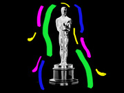 An Oscar statuette on a black background surrounded by colorful painted brush strokes in green, pink, blue, and yellow.